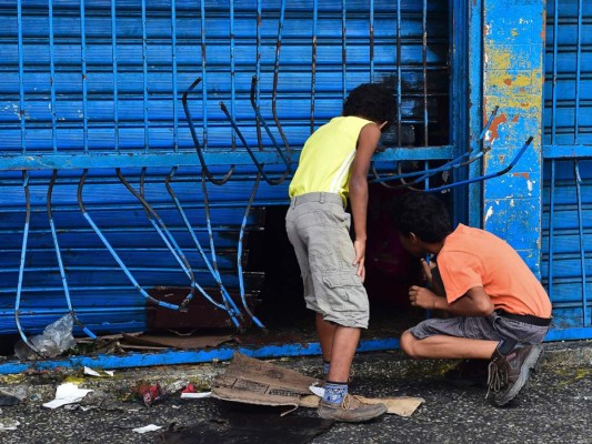 FOTOS: Violencia recrudece en Venezuela con protestas y saqueos