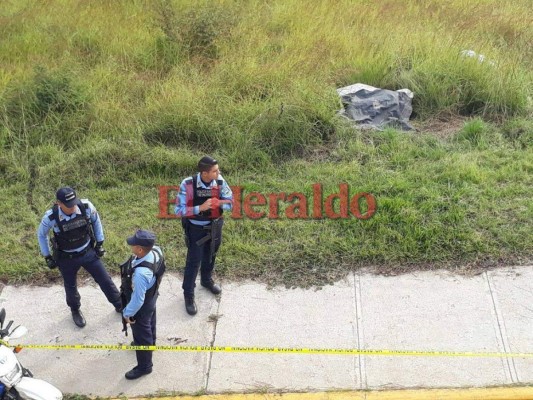Cuerpos encostalados en el anillo periférico de Tegucigalpa eran de madre e hijo