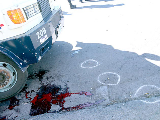 Frustrado asalto a carro de valores deja dos heridos