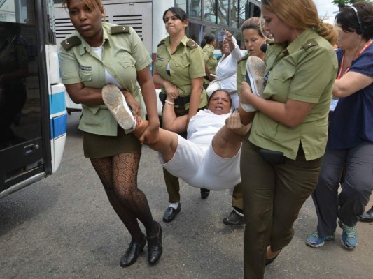 Detenidos decenas de opositores en Cuba antes de arribo de Obama