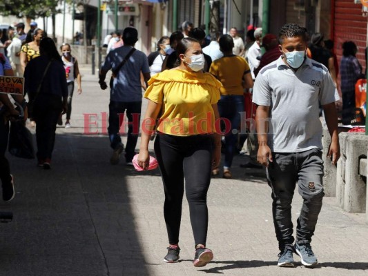 Capitalinos procuran 'normalizar' sus vidas en medio de pandemia y huracanes (FOTOS)