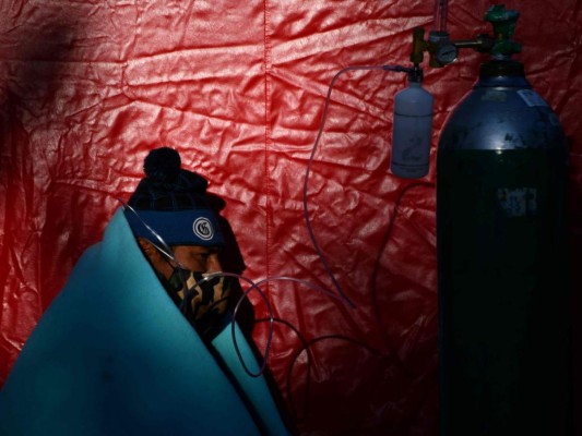 FOTOS: La pandemia deja muertos, penurias y desconfianza en el mundo