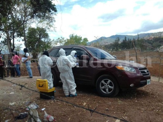 Hallan carro donde se habrían conducido autores de masacre dentro de taller en Comayagüela