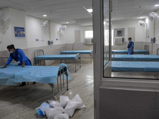 FOTOS: La pandemia deja muertos, penurias y desconfianza en el mundo