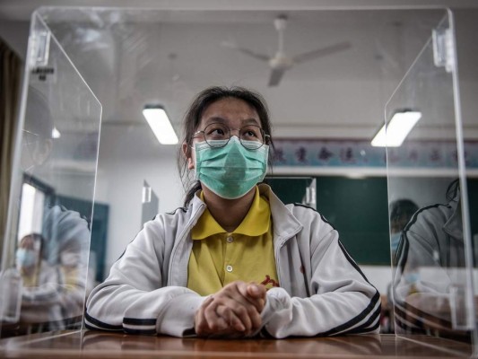 China pide derrotar al coronavirus antes de investigar su origen