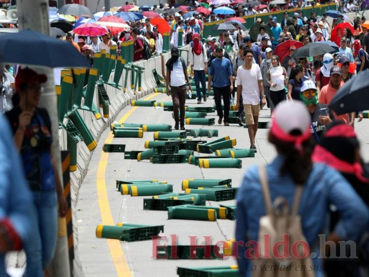 Las 10 imágenes más impactantes de los disturbios que se registraron este jueves en la capital de Honduras