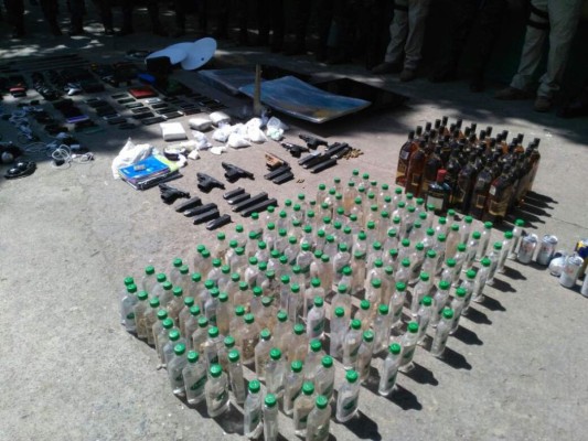 Honduras: Hallan arma 'matapolicías' y drogas en Centro Penal de San Pedro Sula