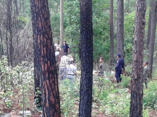 Muertos hallan a dos hombres raptados tras asalto a un furgón