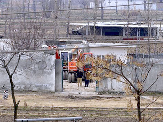 Derribada la residencia de Bin Laden