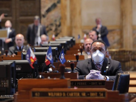 ¿Deberías usar mascarilla si no estás enfermo de COVID-19?