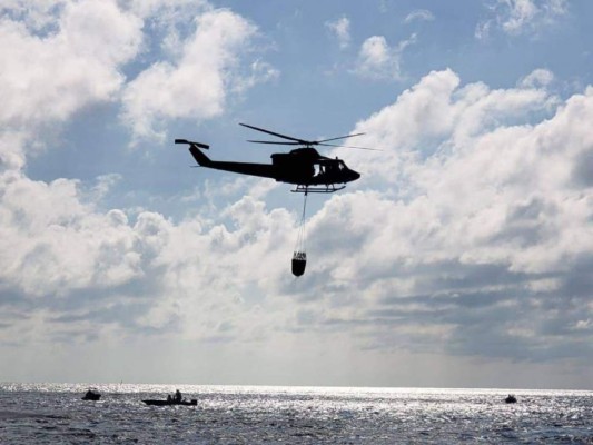 Heridos, daños y rescates aéreos: Las imágenes del trágico incendio en Guanaja  