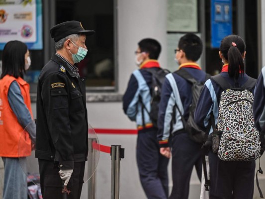 FOTOS: Bajo máxima seguridad, China regresa a clases