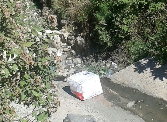 Honduras: En cajas de cartón hallan cuerpos de dos hombres