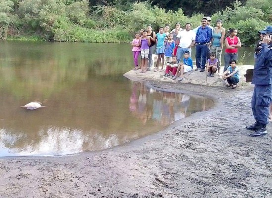 Honduras: Encuentran flotando cadáver en Río Hondo