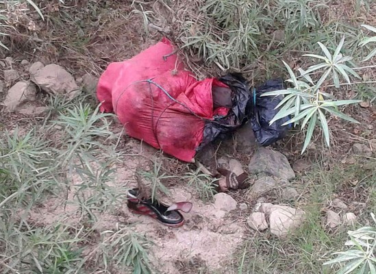 Honduras: Encostalado encuentran cuerpo en la salida al sur