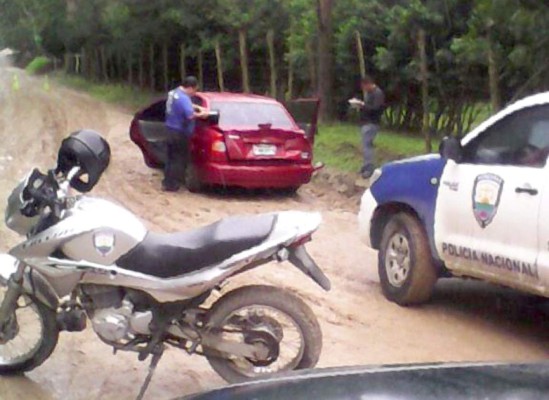 Hallan dos cadáveres dentro de carro en San Pedro Sula