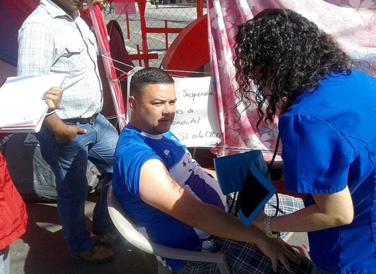 Nueve 'indignados' hondureños en huelga de hambre