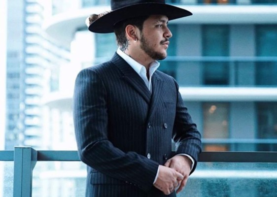 La 'maldición' de tatuarse por amor a Belinda (FOTOS)