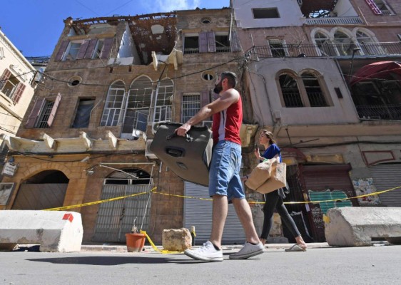 FOTOS: Tras explosión, libaneses huyen del dolor, la corrupción y la crisis política