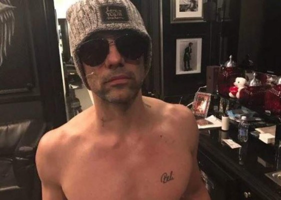 La 'maldición' de tatuarse por amor a Belinda (FOTOS)