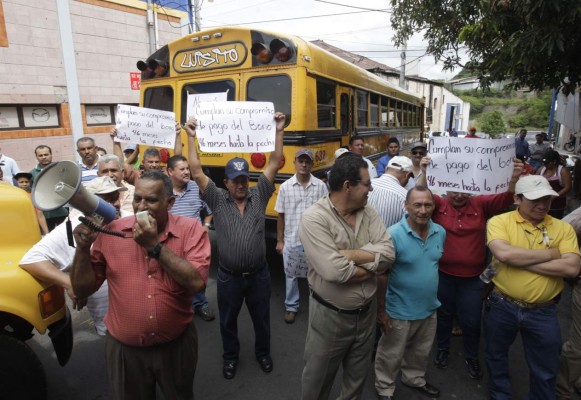 Un millón de lempiras diarios reciben transportistas en bonos