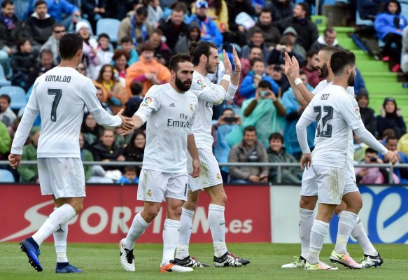 Real Madrid golea al colista Getafe y mete más presión al Barcelona