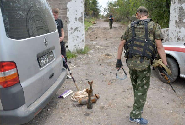 Choques en Ucrania; Putin y Merkel se reúnen en Río
