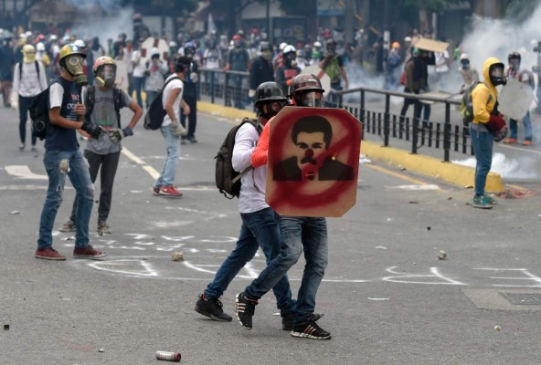 Oposición marchará a corte suprema, detonante de protestas en Venezuela