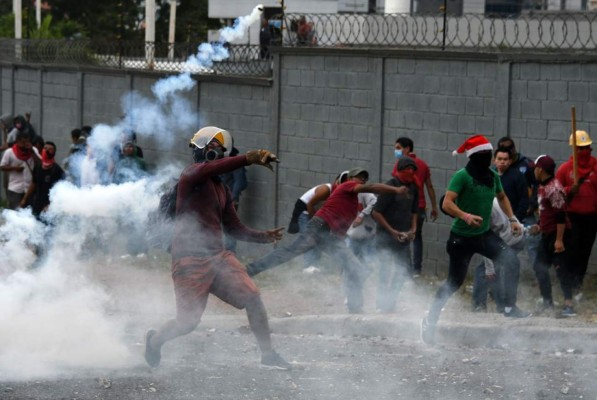 Diez imágenes de los disturbios y protestas en la capital de Honduras