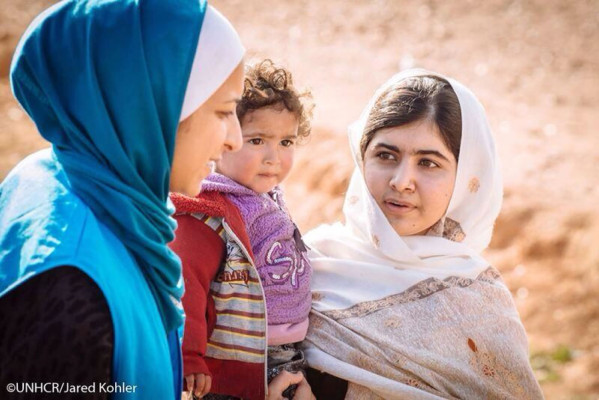 Fotos: Así huyen los niños de la guerra en Siria