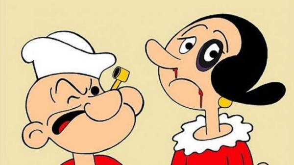 Homero Simpson golpea a Marge y Superman a la Mujer Maravilla