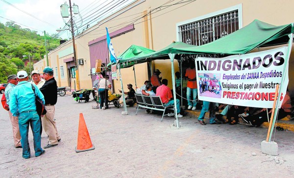 Suspenden huelga de brazos caídos