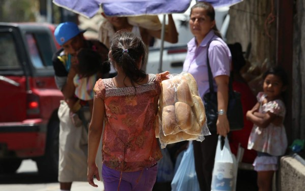 Son felices entre libros y calles de Comayagüela