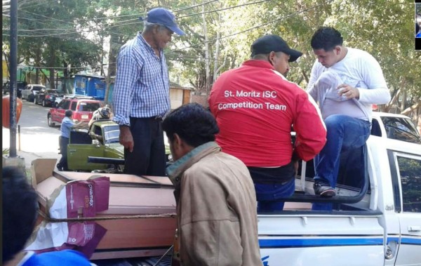 Retiran cadáveres de las víctimas de masacre en la 1 de Diciembre