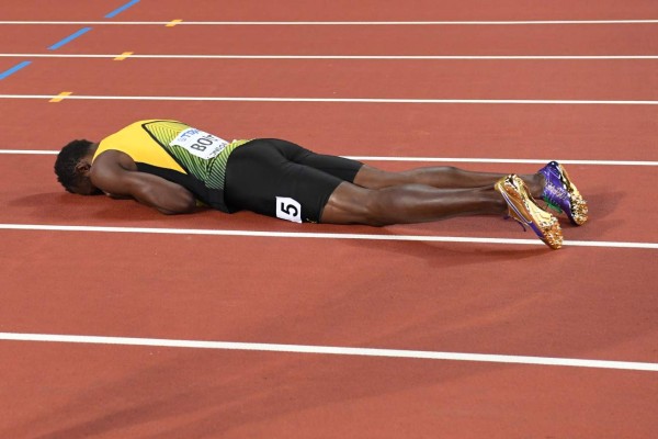 Usain Bolt se lesiona en su última carrera, Gran Bretaña gana el oro mundial en 4x100