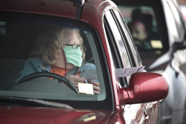 Con mascarrillas y distancia, Wisconsin va a elecciones pese al Covid-19