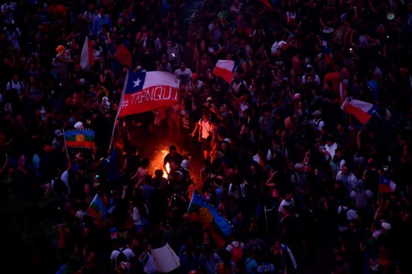 Las fotos más impactantes de las protestas en Chile contra el gobierno
