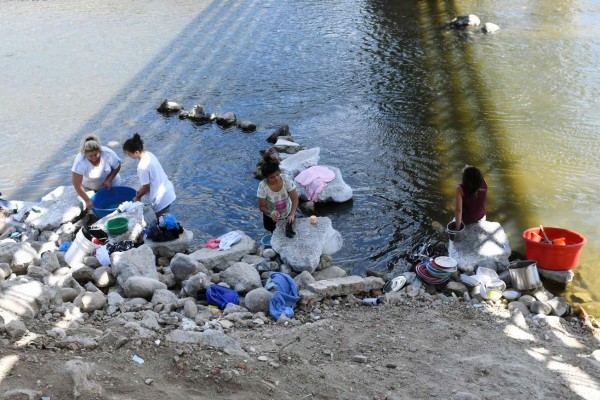 El río en su recorrido es usado en distintas labores como consumo humano y para los cultivos (Foto: AFP/ El Heraldo Honduras/ Noticias de Honduras)