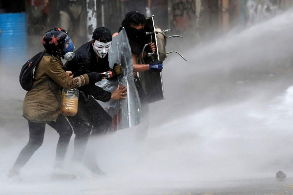 Las fotos más impactantes de las protestas en Chile contra el gobierno