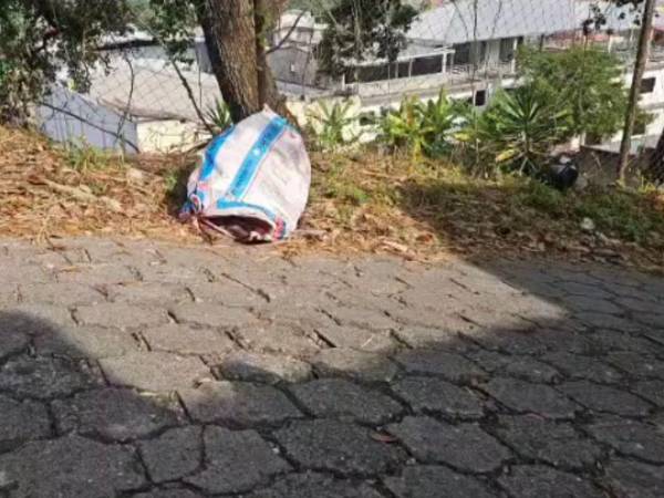 El cuerpo fue hallado dentro de un costal detrás del cementerio municipal de La Entrada, Copán; las autoridades investigan el hecho.