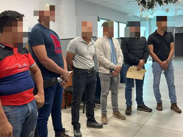 Los agentes de la DPI asistieron a audiencia inicial este jueves en San Pedro Sula.