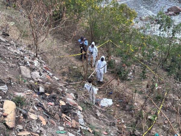 El cuerpo del joven estaba cerca de la ribera del río.