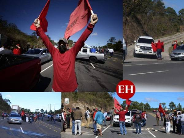 Varios militantes del Partido Libertad y Refundación (Libre) bloquearon las calles de Zambrano, en la carretera CA-5, para protestar por la juramentación de Jorge Cálix y la nueva junta directiva del Congreso Nacional 2022-2026. Fotos: Emilio Flores | EL HERALDO.