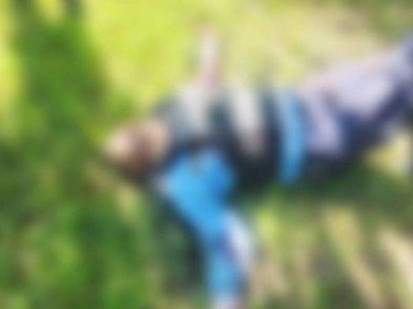 Escena donde quedó el cuerpo sin vida del agente Ávila.