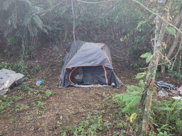 El campamento estaba en una zona boscosa y montañosa de Choloma.