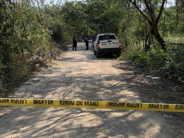 Un guardia de seguridad fue interceptado en una solitaria calle de tierra en la carretera que conecta La Sabana con la colonia Brisas del Plan, en San Manuel, Cortés.
