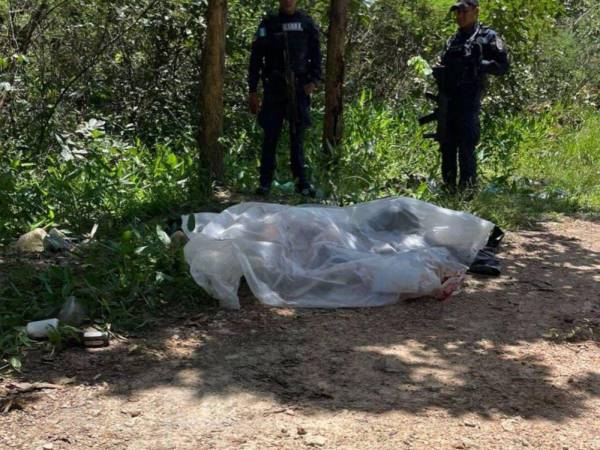 Los cuerpos de Favio Alejandro Rivera y José Geovanny Guardado Rivera fueron encontrados en una calle de tierra en Quilíz, Catacamas.