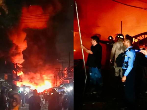 Un devorador incendio que inició en un negocio de cohetes consumió la mayoría de puestos ubicados en la calle 6, en el barrio Medina, en la ciudad de San Pedro Sula, registrado durante este lunes 29 de diciembre.