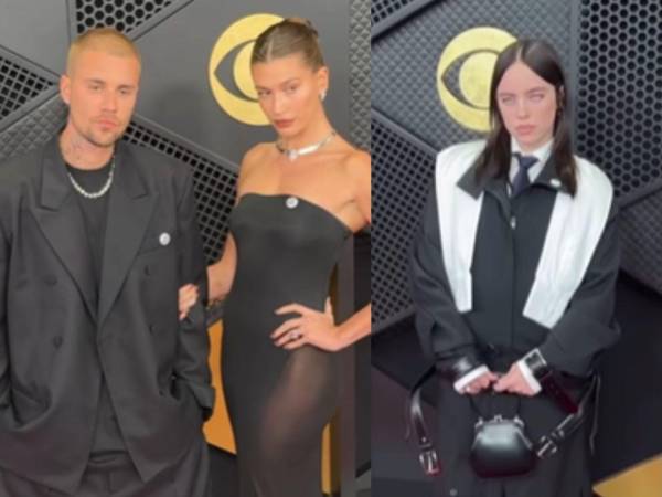 Las cámaras captaron a los artistas posando con los pins mientras llegaban al Crypto.com Arena en el centro de Los Ángeles.