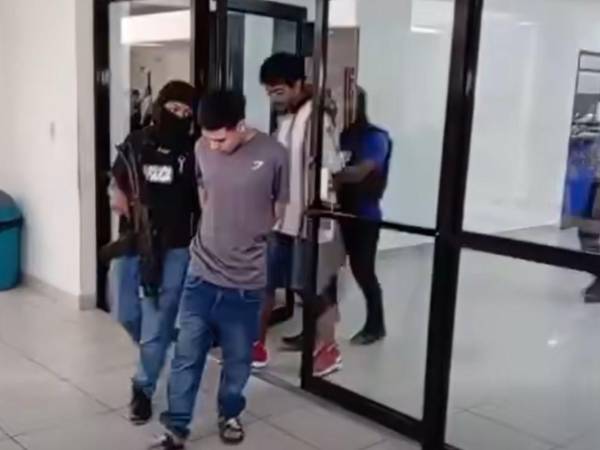Los dos sujetos son acusados del crimen de tres estudiantes en El Progreso, Yoro.